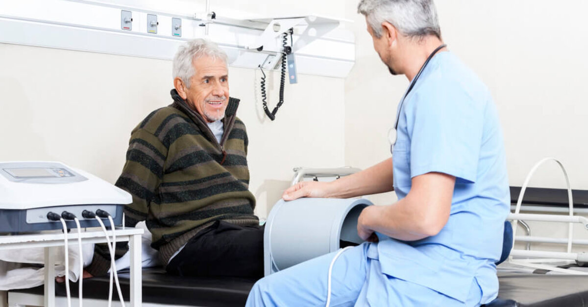 stock photo senior patient receiving electromagnetic therapy